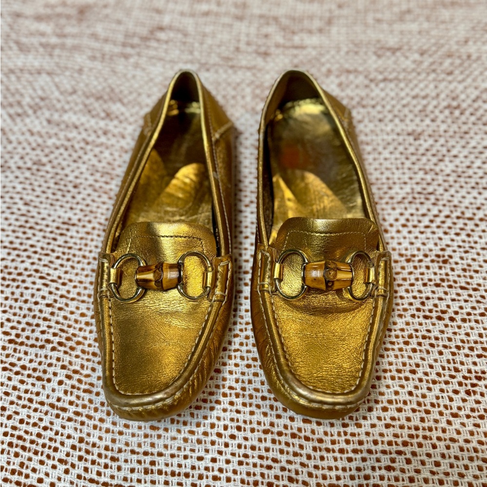 Authentic gold Gucci loafers